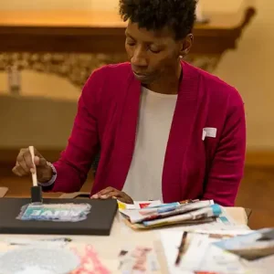 Woman making collage