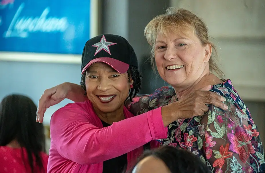 Women hugging at Project31 event