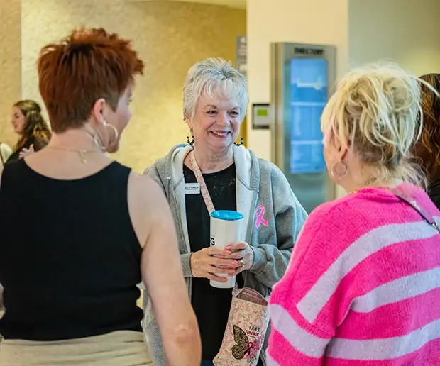 Women talking before support group