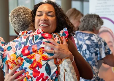Two friends hug