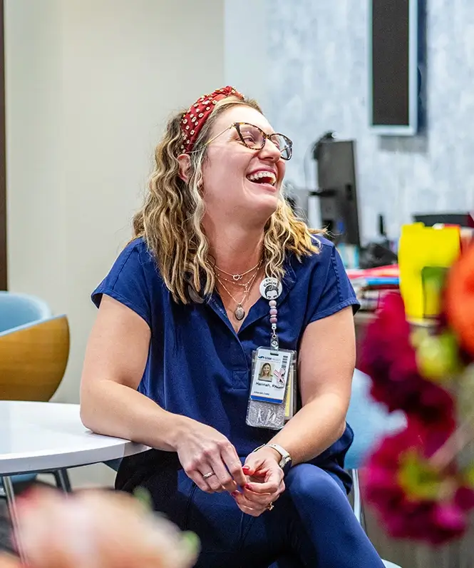 Nurse laughing during support group event