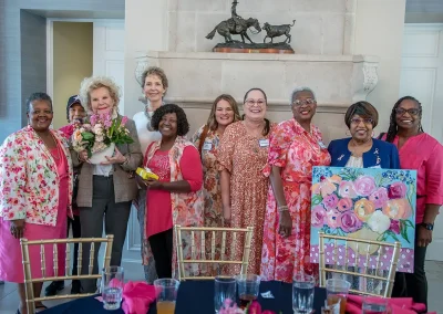 A group of raffle prize winners from a survivors' brunch