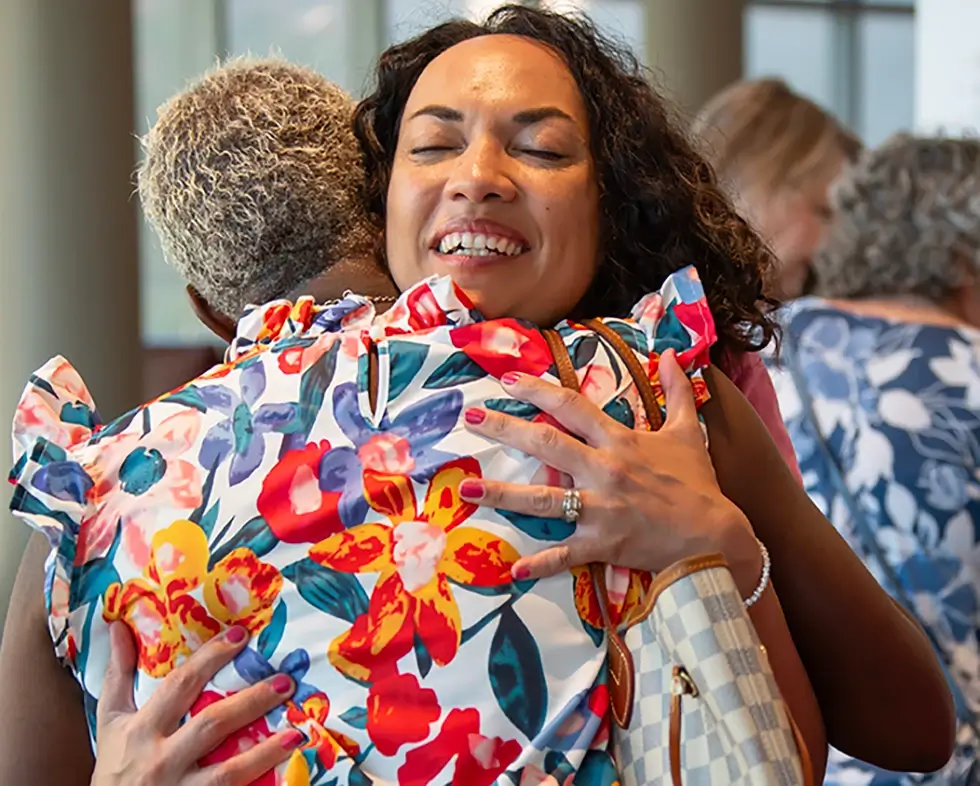 Two women embracing
