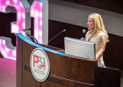 A doctor gives a speech at a podium