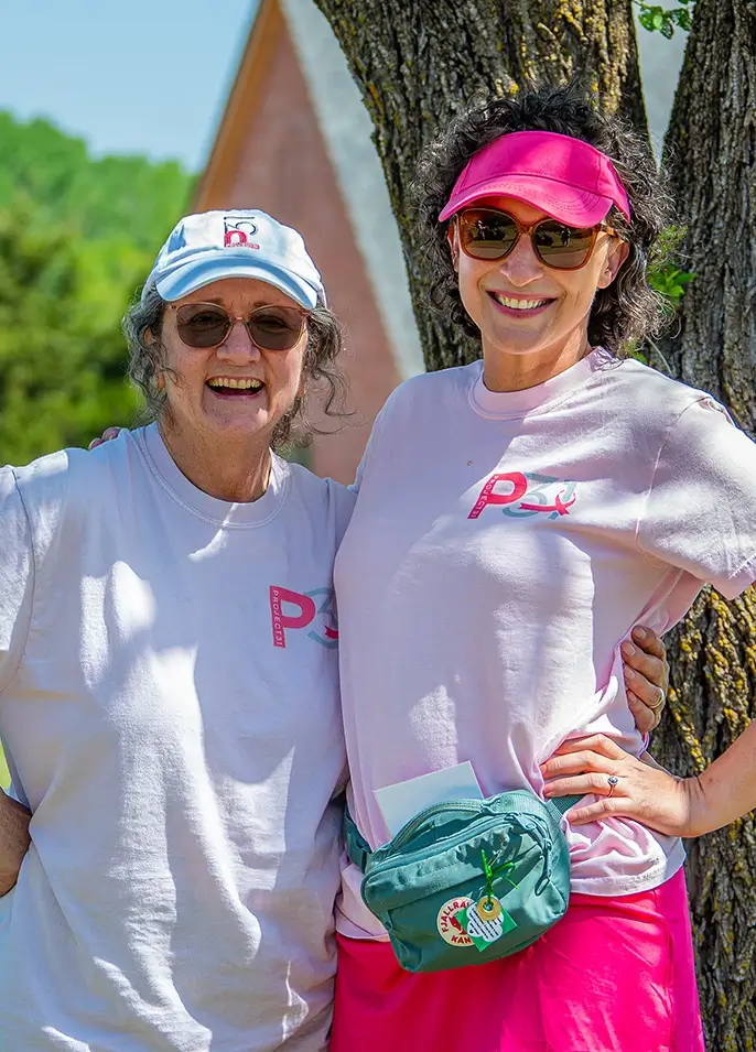 Women smiling at Sink4Pink golf tournament