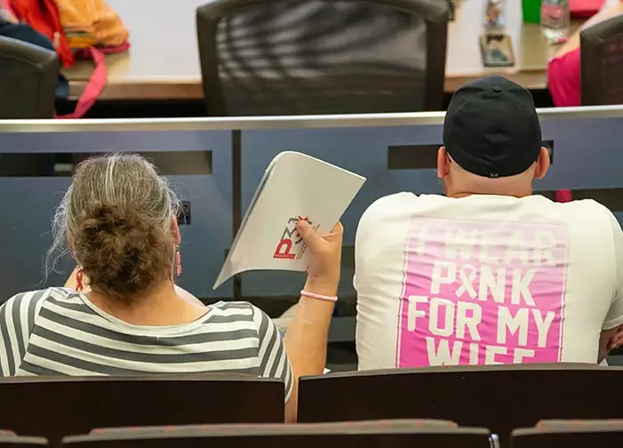 Wife and husband learning at Expo