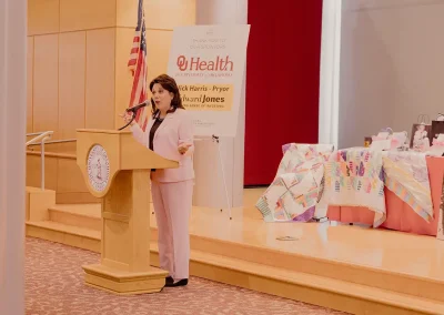 A doctor gives a speech at a podium